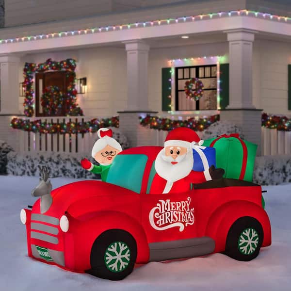 8.5 ft. LED Mr. and Mrs. Claus in Truck Inflatable
