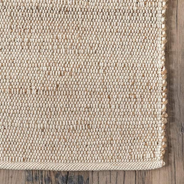 Elfriede Solid Jute Natural 9 ft. x 12 ft. Area Rug