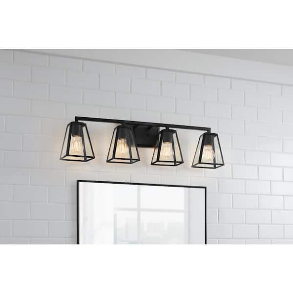 Mackenzie Place 30 in. 4-Light Matte Black Modern Bathroom Vanity Light with Clear Glass Shades