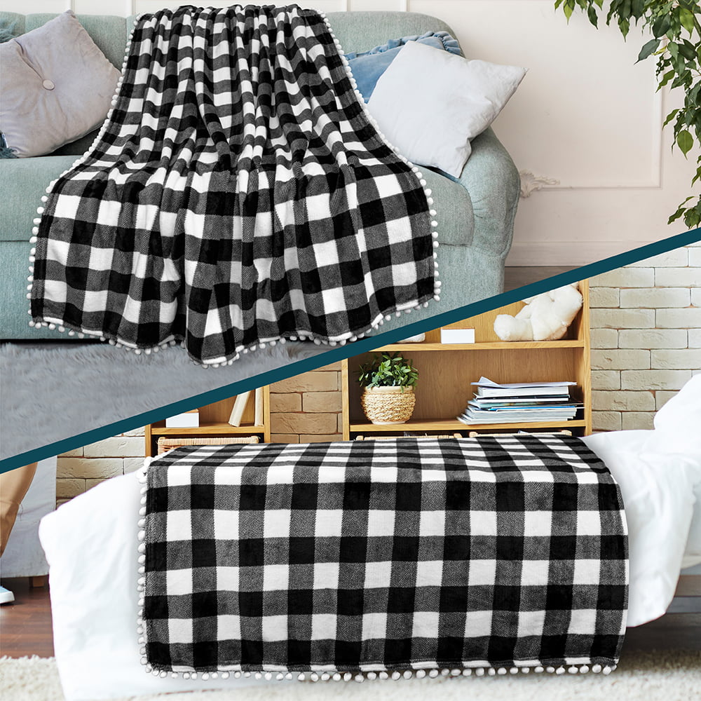 PAVILIA Fleece Throw Blanket with Pom Pom Fringe | Buffalo Plaid Checkered White, Black Flannel Throw | Super Soft Lightweight Microfiber Polyester | Plush, Fuzzy, Cozy | 50 x 60 Inches