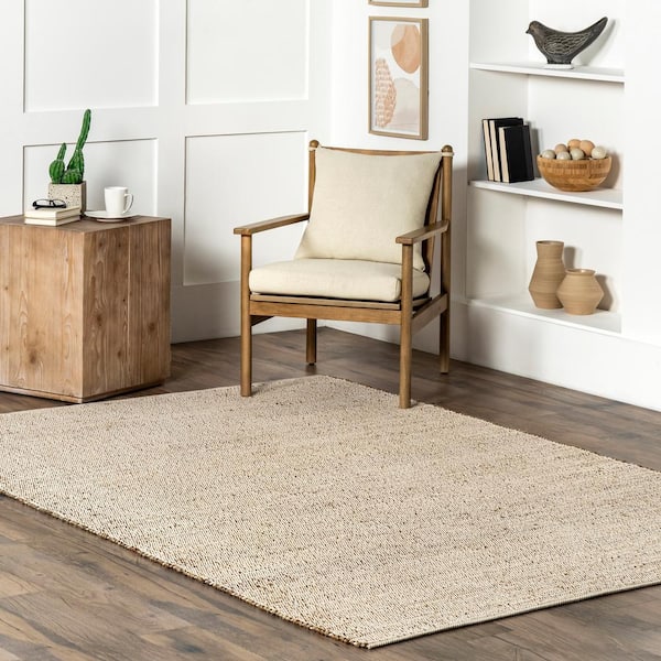Elfriede Solid Jute Natural 9 ft. x 12 ft. Area Rug