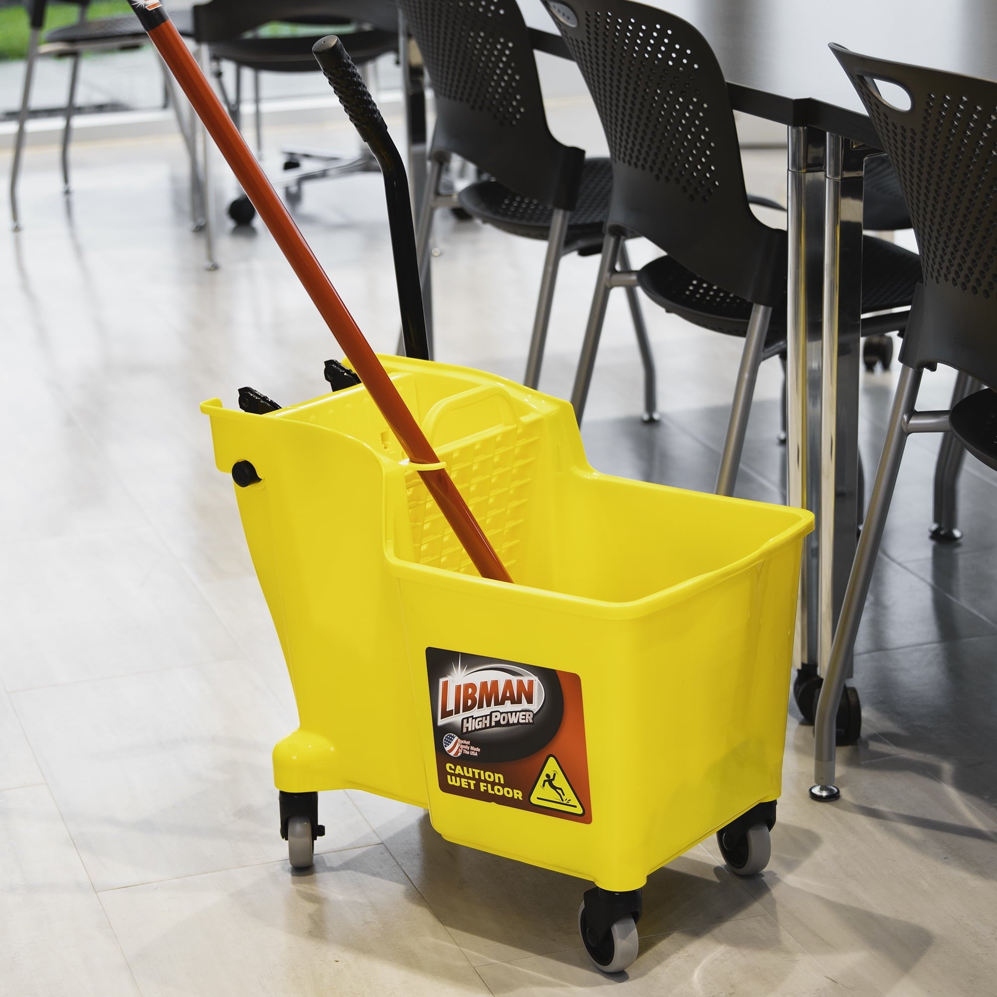 Libman Yellow 32 Quart Mop Bucket and Wringer with Rubber Caster Wheels.
