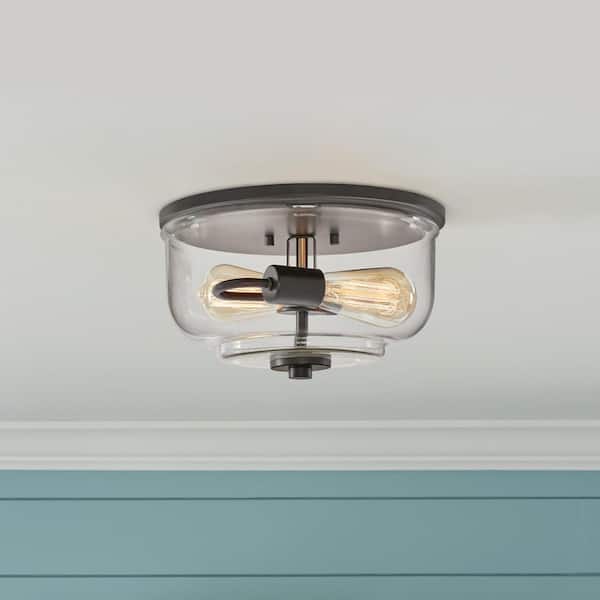 Knollwood 12 in. 2-Light Blackened Bronze Industrial Flush Mount with Vintage Brass Accents and Clear Glass Shade