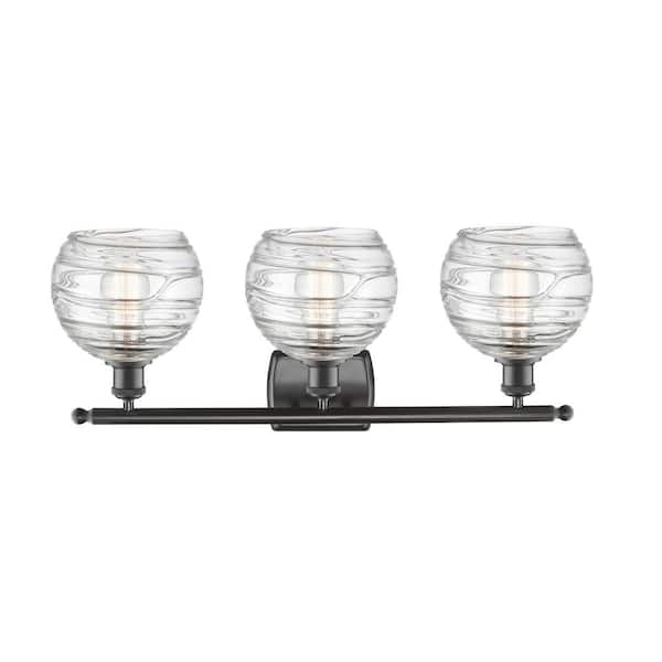 Athens Deco Swirl 26 in. 3-Light Oil Rubbed Bronze Vanity Light with Clear Deco Swirl Glass Shade
