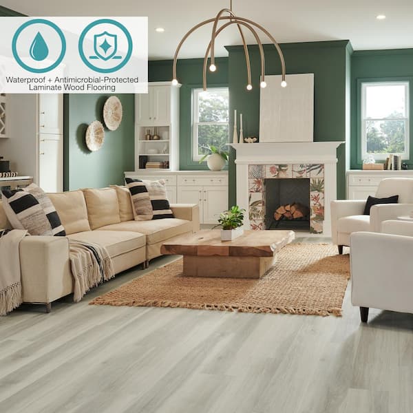 Defense+ 7.4 in. W Cove Mist Oak Waterproof Laminate Wood Flooring (17.18 sq. ft./case)