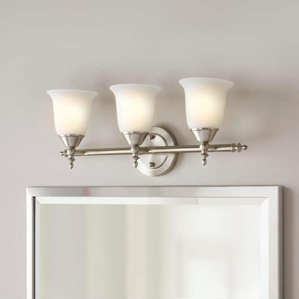 Olgelthorpe 22 in. 3-Light Brushed Nickel Bathroom Vanity Light Fixture with Bell Shaped Frosted Glass Shades