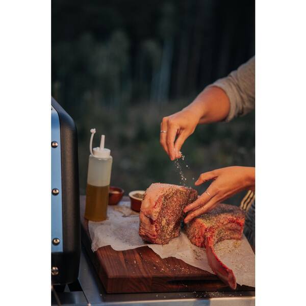 Genesis E-435 4-Burner Propane Gas Grill in Black with Side Burner