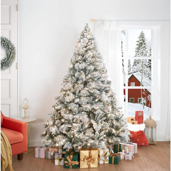 6.5ft. Frosted Snow Flocked Prelit Artificial Christmas Tree with Pine Cones, Foot Pedal, 650 Warm Light and Metal Stand