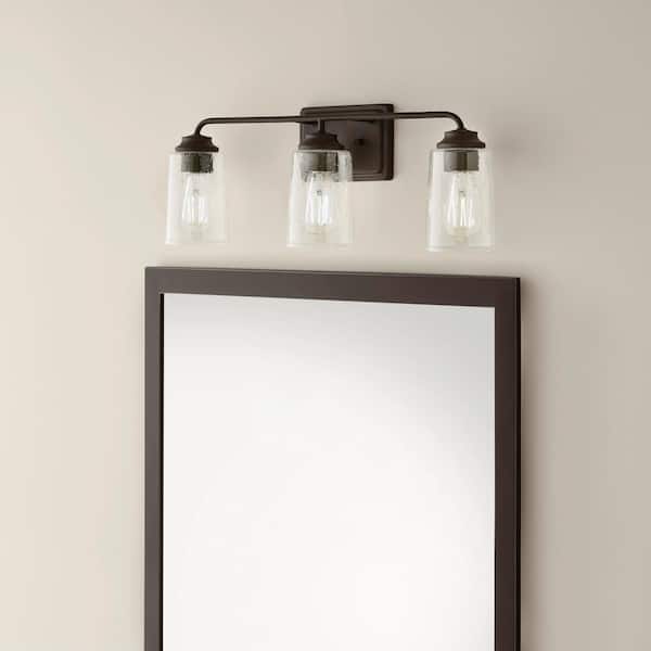Evangeline 23 in. 3-Light Modern Bronze Farmhouse Bathroom Vanity Light with Clear Seeded Glass Shades
