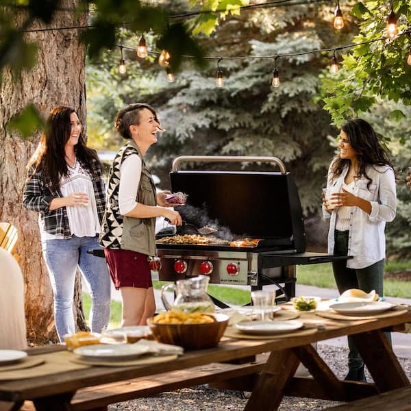 4-Burner Propane Flat Top Grill in Black with Lid