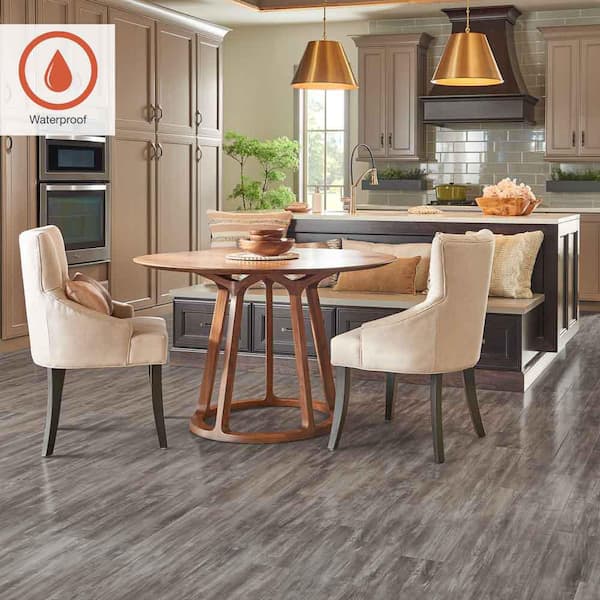 Outlast+ Seabrook Walnut 12 mm T x 5.2 in. W Waterproof Laminate Wood Flooring (13.7 sqft/case)
