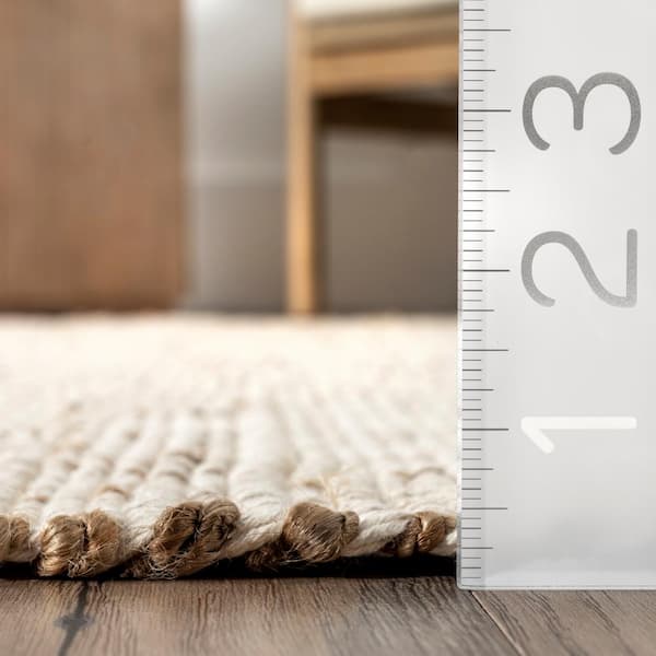 Elfriede Solid Jute Natural 9 ft. x 12 ft. Area Rug