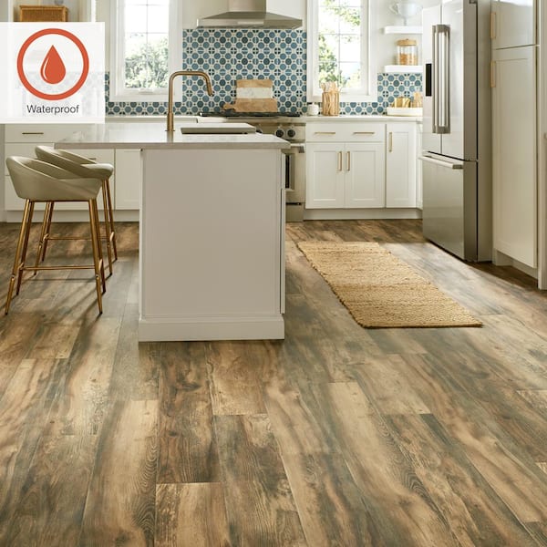 Outlast+ Weathered Grey Wood 12 mm T x 7.4 in. W Waterproof Laminate Wood Flooring (16.9 sqft/case)
