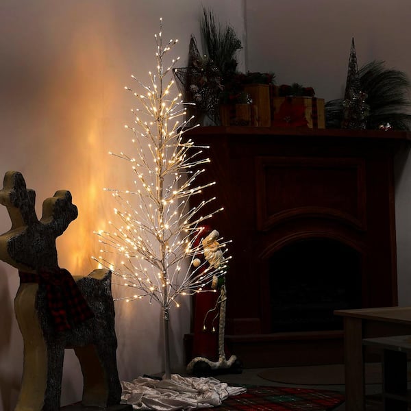 65 in. H Indoor/Outdoor Pre-Lit Silver Foil Christmas Tree with Yard Stake and 360 LED Lights