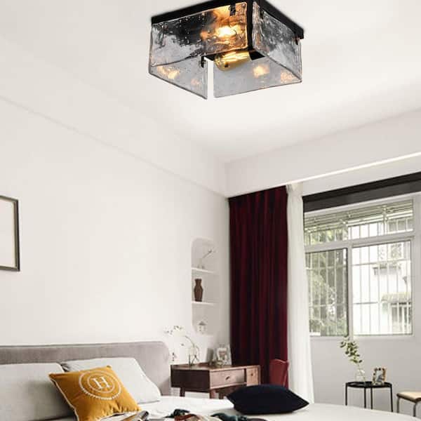 Raleigh 2-Light 11.81 in. Black Flush Mount with Water Glass Shade