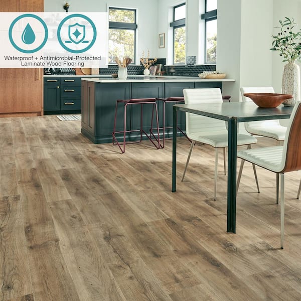 Defense+ Tanned Chester Oak 14 mm T x 7.4 in. W Waterproof Laminate Wood Flooring (17.2 sqft/case)