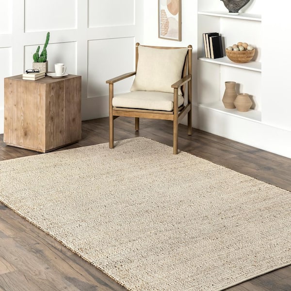 Elfriede Solid Jute Natural 9 ft. x 12 ft. Area Rug