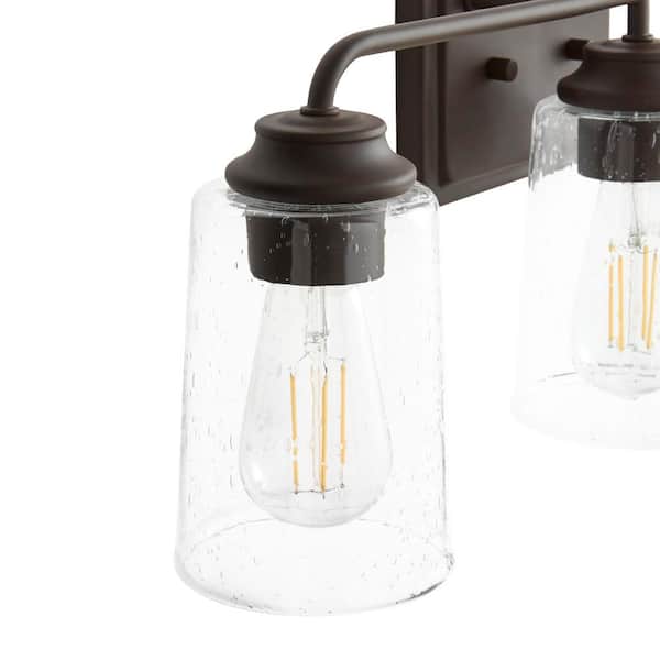 Evangeline 23 in. 3-Light Modern Bronze Farmhouse Bathroom Vanity Light with Clear Seeded Glass Shades