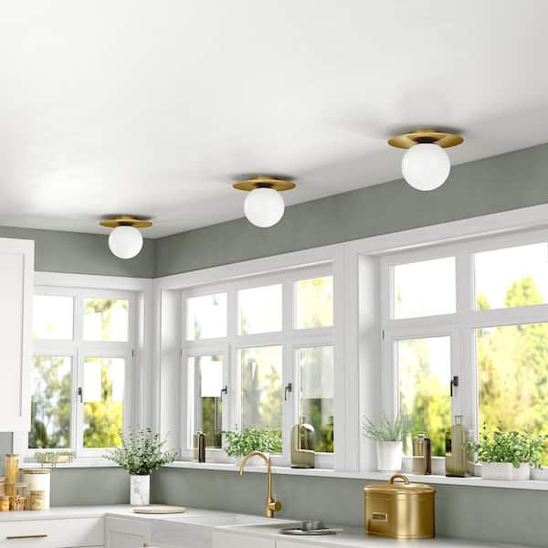 Amma 12 in. 1-Light Brushed Brass and White Flush Mount with Glass Shade