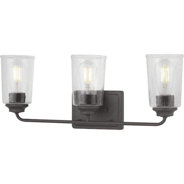 Evangeline 23 in. 3-Light Modern Bronze Farmhouse Bathroom Vanity Light with Clear Seeded Glass Shades