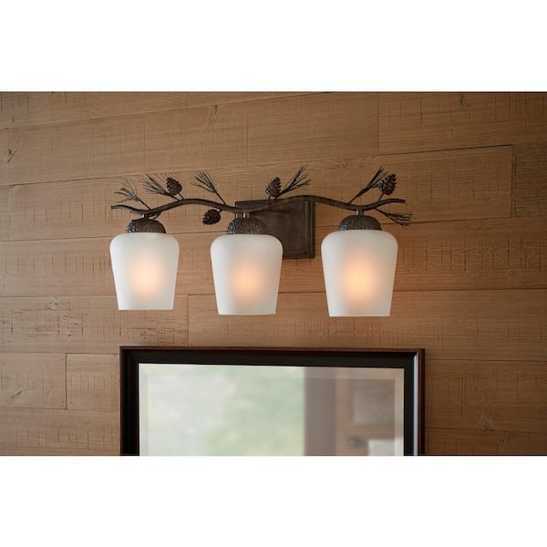 Spruce Lodge 25 in. 3-Light Handmade Pinecone Vanity Light with Frosted Glass Shade