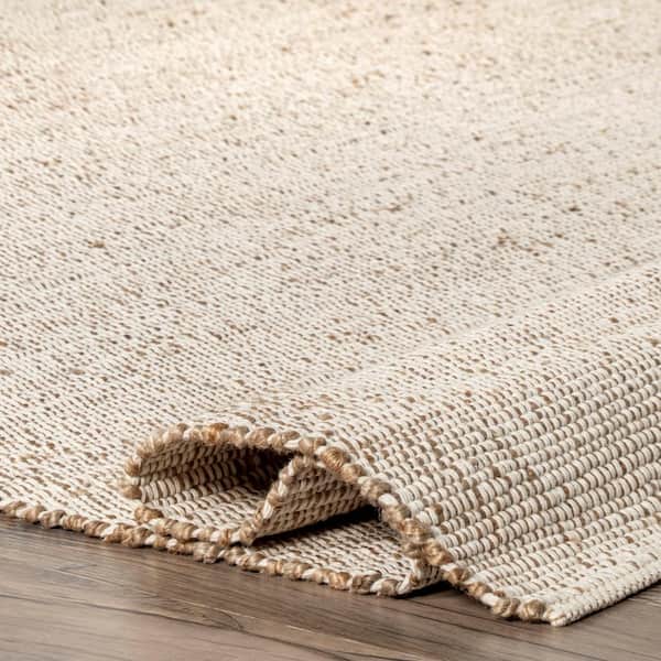 Elfriede Solid Jute Natural 9 ft. x 12 ft. Area Rug