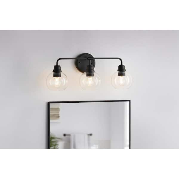 Florabelle 24 in. W 3-Light Vanity Light Matte Black Clear Globe Glass Shades