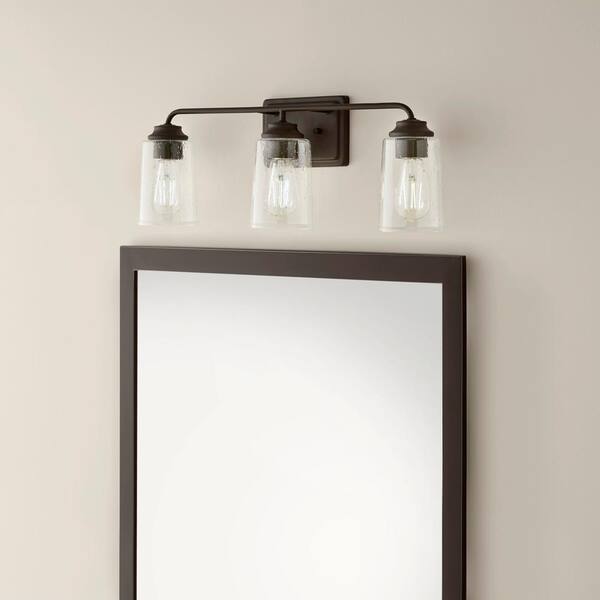 Evangeline 23 in. 3-Light Modern Bronze Farmhouse Bathroom Vanity Light with Clear Seeded Glass Shades