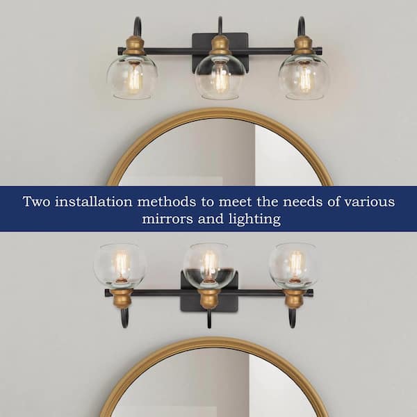 22 in. 3-Light Modern Aged Brass and Black Bathroom Vanity Light with Clear Glass Globe Shades