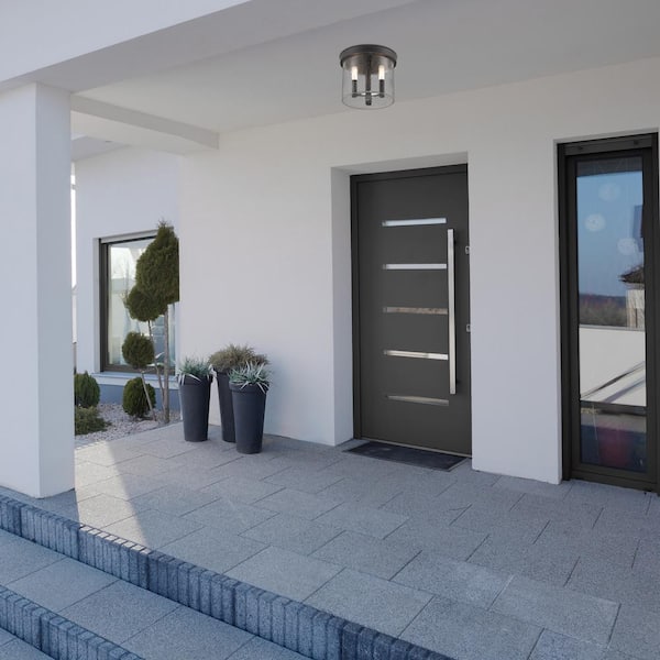 Otto 10 in. 3-Light Matte Black Modern Outdoor Flush Mount Light with Clear Seedy Glass Shade