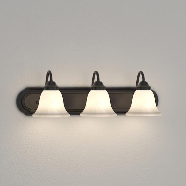 Solvang 24 in. 3-Light Antique Bronze Traditional Bathroom Vanity Light with Alabaster Glass