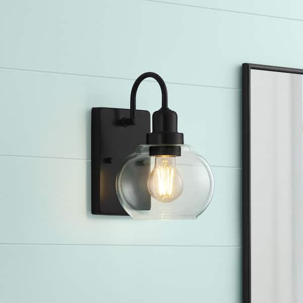 Halyn 1-Light Matte Black Coastal Indoor Wall Sconce with Clear Glass Shade for Bath and Dining