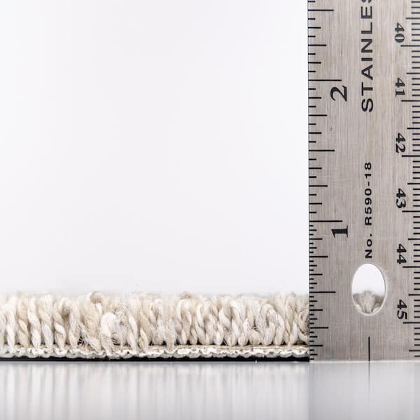 Island Hop  - Bridle - Beige 45 oz. SD Polyester Pattern Installed Carpet