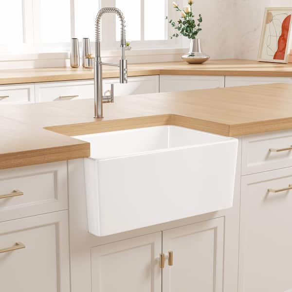 Denbigh Crisp White Ceramic 24 in. Single Bowl Farmhouse Apron Kitchen Sink with Bottom Grid and Basket Strainer
