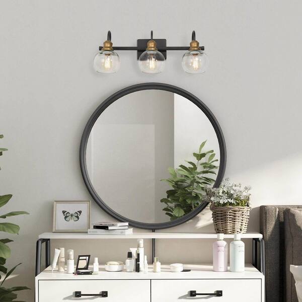 22 in. 3-Light Modern Aged Brass and Black Bathroom Vanity Light with Clear Glass Globe Shades