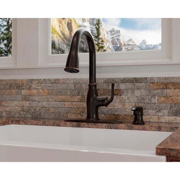 Rosslyn Single Handle Pull Down Sprayer Kitchen Faucet with Deckplate Included in Tuscan Bronze