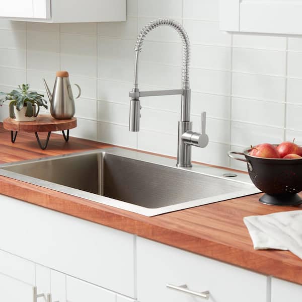 Statham Single-Handle Coil Spring Neck Kitchen Faucet in Stainless Steel