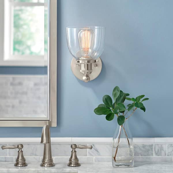 Evelyn 6 in. 1-Light Brushed Nickel Industrial Wall Sconce with Clear Glass Shade