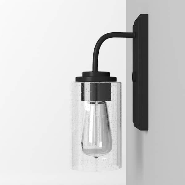 Logan 4.5 in. 1-Light Matte Black Modern Transitional Wall Sconce with Clear Seedy Glass Shade