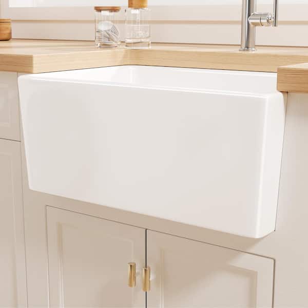 Denbigh Crisp White Ceramic 24 in. Single Bowl Farmhouse Apron Kitchen Sink with Bottom Grid and Basket Strainer