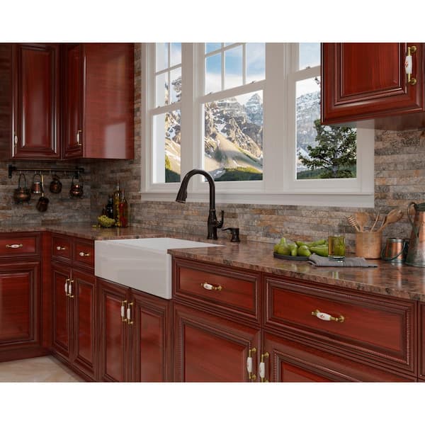 Rosslyn Single Handle Pull Down Sprayer Kitchen Faucet with Deckplate Included in Tuscan Bronze