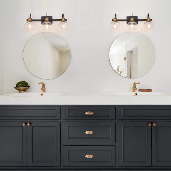 22 in. 3-Light Modern Aged Brass and Black Bathroom Vanity Light with Clear Glass Globe Shades