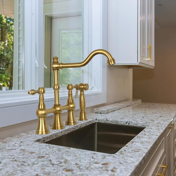 Double Handle Bridge Kitchen Faucet with Side Sprayer in Brushed Gold