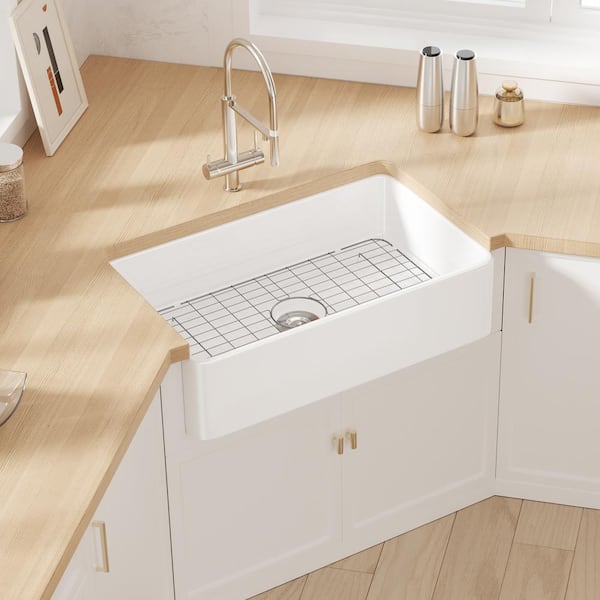 Denbigh Crisp White Fireclay 33 in. Single Bowl Farmhouse Apron Kitchen Sink with Bottom Grid and Basket Strainer