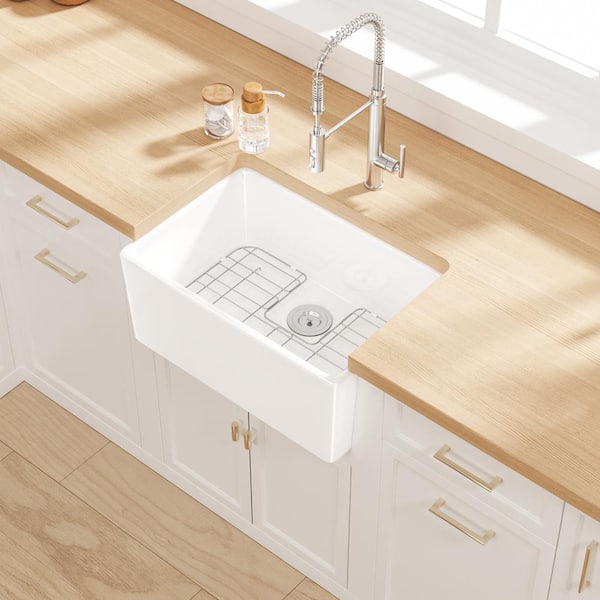 Denbigh Crisp White Ceramic 24 in. Single Bowl Farmhouse Apron Kitchen Sink with Bottom Grid and Basket Strainer