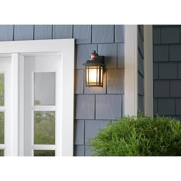 Port Oxford 10.625 in. 1-Light Oil Rubbed Chestnut Motion Sensing Outdoor Wall Mount Lantern