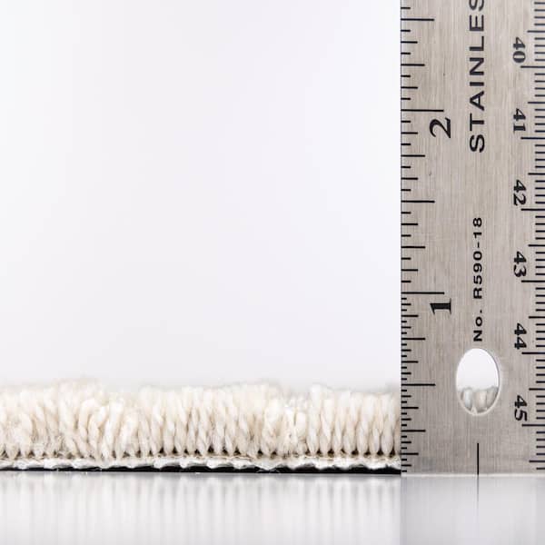 One Big Holiday  - Tropic - Beige 45 oz. SD Polyester Pattern Installed Carpet