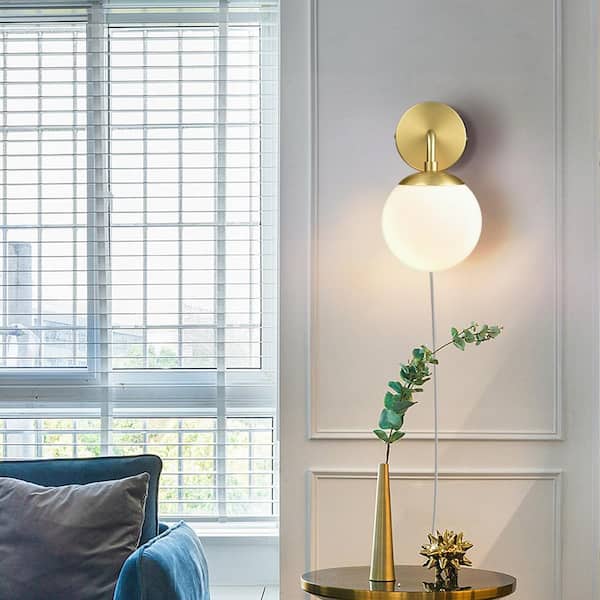 Greta 4.75 in. Brushed Brass/White Globe Plug-In Wall Sconce with Glass Shade