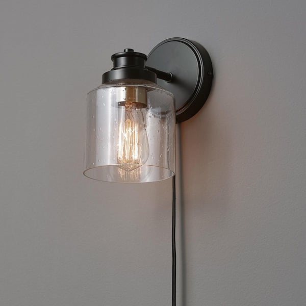 1-Light Matte Black Plug-In or Hardwire Wall Sconce with Seeded Glass Shade, In-Line On/Off Rocker Switch, 6 ft. Cord
