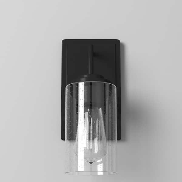 Logan 4.5 in. 1-Light Matte Black Modern Transitional Wall Sconce with Clear Seedy Glass Shade